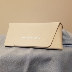 Michael Kors cream eyeglass case.
